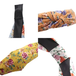 Close-up details of floral headband, fabric texture, knot design, and black inner lining.