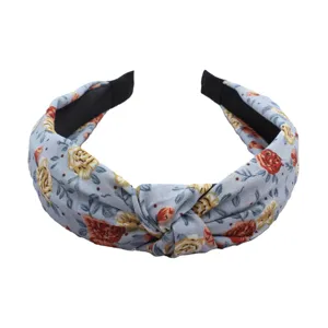 Blue floral knotted fabric headband, cute wide-brimmed hair hoop for women and girls.