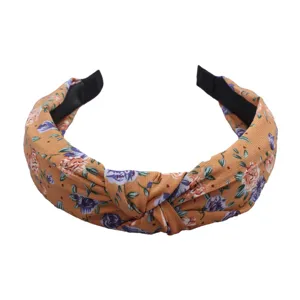 Floral knotted fabric headband for women, cute wide-brim hair accessory, yellow hair band.