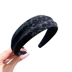 Retro leopard print wide headband for women, stylish high cranial top hair hoop fashion accessory.