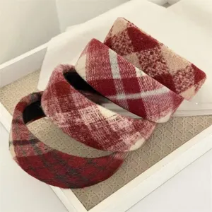 Detail view of red plaid woolen wide hair hoop, classic tweed style headband for daily wear.