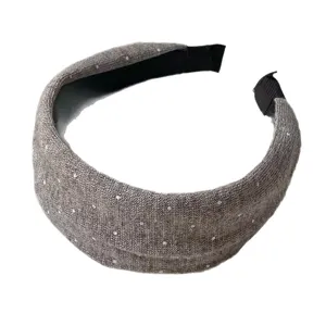 Grey knit headband for women with cute white polka dots, vintage winter hair accessory stylish.