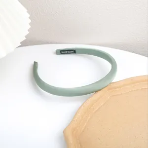 Elegant green satin thin headband for women, chic hair hoop for daily wear and face washing.