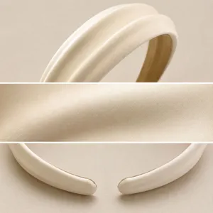 Beige padded headband for women, elegant wide hair hoop, high top chic hair accessory style.