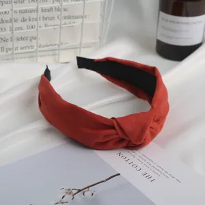 Minimalist suede knotted headband for women, chic vintage hair hoop for daily fashion styling.