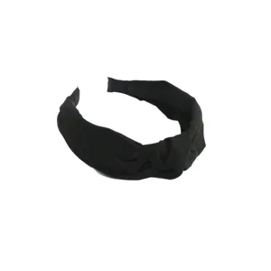 Simple black suede knotted headband for women, fashionable everyday hair accessory for styling.