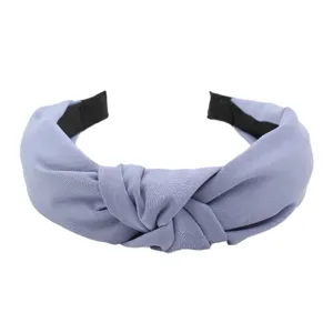 Light purple fabric knotted headband, stylish solid color hair accessory for women daily wear.