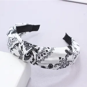 Schwarz-weiße Paisleymuster Stoffhaarreif, retro breiter Haarschmuck für Damenalltag.