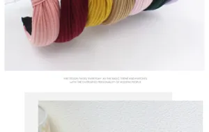Knitted cross headband detail view, wide fabric hair hoop showcasing soft texture and colors.