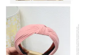 Pink knitted headband for women, wide cross hair hoop, soft fabric daily face wash hair accessory.