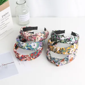Sweet floral knotted headband for women, stylish daily hair accessories detail view.
