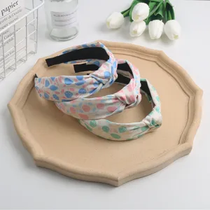 Chic floral knotted headbands for women, sweet fabric hair hoops, stylish daily hair accessories.