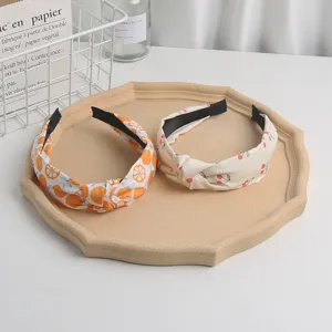 Women fabric knotted headbands set with orange and cherry prints, daily cute hair accessories.