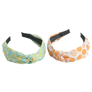 Stylish knotted fabric headbands featuring refreshing fruit prints for daily wear and styling.