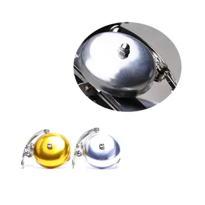 Detailed view of the bicycle bell mounting and metallic surface texture, perfect close-up.