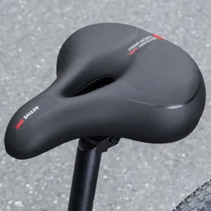 Comfortable bicycle saddle detail shot, ergonomic black bike seat cushion with shock absorption.