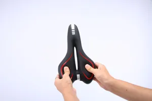 Ergonomic hollow bike saddle detail showing soft cushioning and flexibility for comfort.