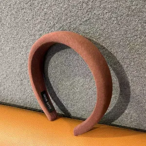 Detail view of a vintage brown thick sponge headband, comfortable wide hair hoop for daily style