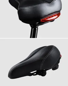 Sella per bicicletta ergonomica, spessa e larga con luce di sicurezza posteriore.