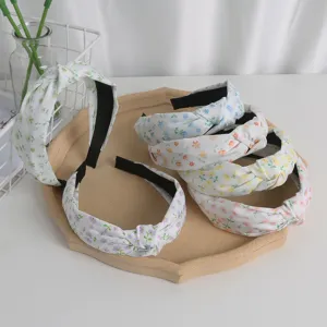Detailed view of sweet floral knotted headbands, retro wide hair hoops for daily fresh style.