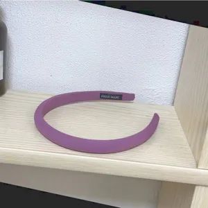 Purple sponge thin hair hoop detail view, trendy candy color headband for daily washing and styling.