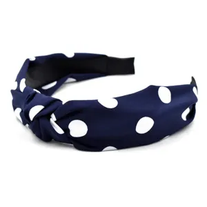 Serre-tête en tissu bleu marine à pois blancs, bandeau noué élégant pour femmes au quotidien.