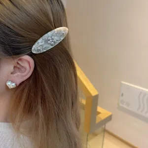 Elegant acetate hair clip with marble pattern and silver bead flower decor for women sweet style.