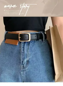 Detailed view of a stylish women leather belt with square gold buckle and denim jeans match.