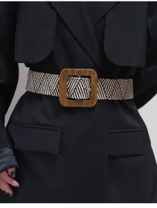 Woven elastic waist belt with wooden square buckle, wide fabric belt for women daily wear.