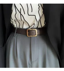Classic brown leather women belt with gold square buckle stylish waist accessory fashion detail view.