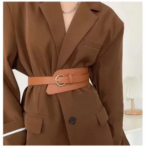 Wide brown leather belt detail shot, vintage waist cincher accessory for coat and blazer dress.