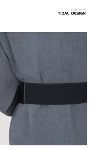 Wide black elastic waist belt detail, perfect for styling coats, suits, and sweaters.