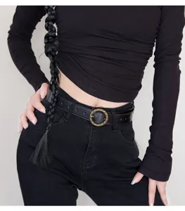 Stylish women's black leather belt featuring an antique gold twisted round buckle for jeans.