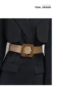 Woven straw waist belt with large square wooden buckle detail shot showcasing stylish design for women