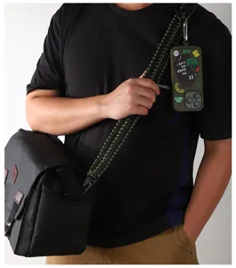 Durable paracord shoulder strap with carabiner and woven design for outdoor bags and keys.