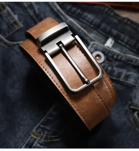Vintage brown leather belt detail, classic pin buckle design, casual jeans belt for daily wear.