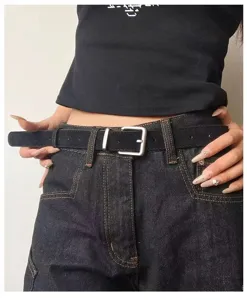 Close-up detail of the slim women waist belt with metal buckle, stylish daily wear accessory.