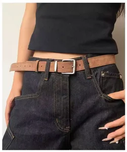 Detailed view of the brown vintage waist belt featuring a classic metal pin buckle style.