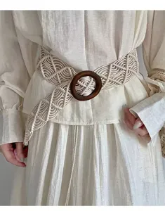 Bohemian handmade woven waist belt with wooden buckle, elegant dress accessory for women.