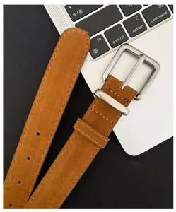 Brown retro belt with vintage metal buckle, minimalist design for women fashion daily wear.
