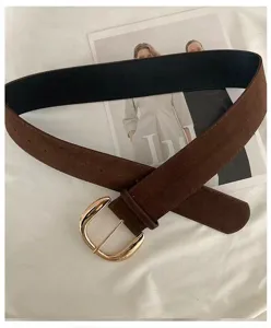 Retro suede women belt with golden metal buckle, elegant vintage design for casual wear details.