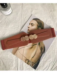 Wide elastic waist belt for women, fashionable decorative dress belt with metal round buckle.