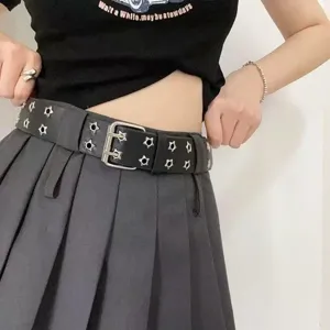 Women punk style black leather belt with metal star grommets, trendy retro waist accessory.