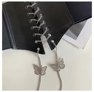 Black wide corset belt for women, featuring metal chain lace-up and chic butterfly pendants.