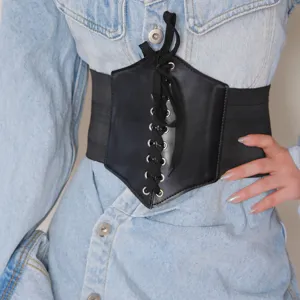 Wide black corset belt for women, stylish elastic lace-up waist cincher dress accessory.