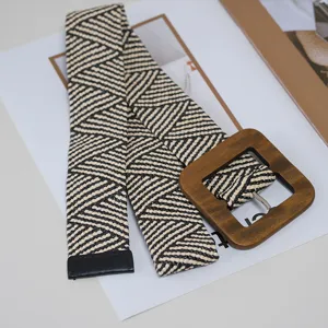 Women's woven belt with wooden square buckle, black and white geometric pattern casual style.