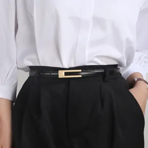 Slim black leather belt for women, minimalist gold buckle, versatile dress waist belt.