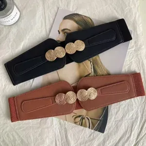 Wide elastic waist belt for women with stylish gold circle buckle, chic dress cinch.