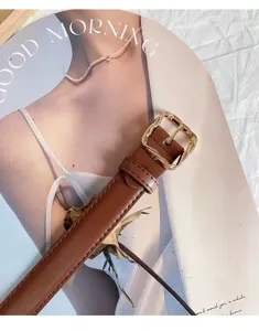 Stylish women's brown belt featuring a chic twisted gold square buckle for versatile everyday wear.