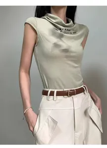 Stylish women brown leather belt paired with casual top and cargo pants for daily wear.